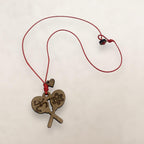 Artesanía en Madera - Collar Maracas con Símbolos Taínos *One Size*