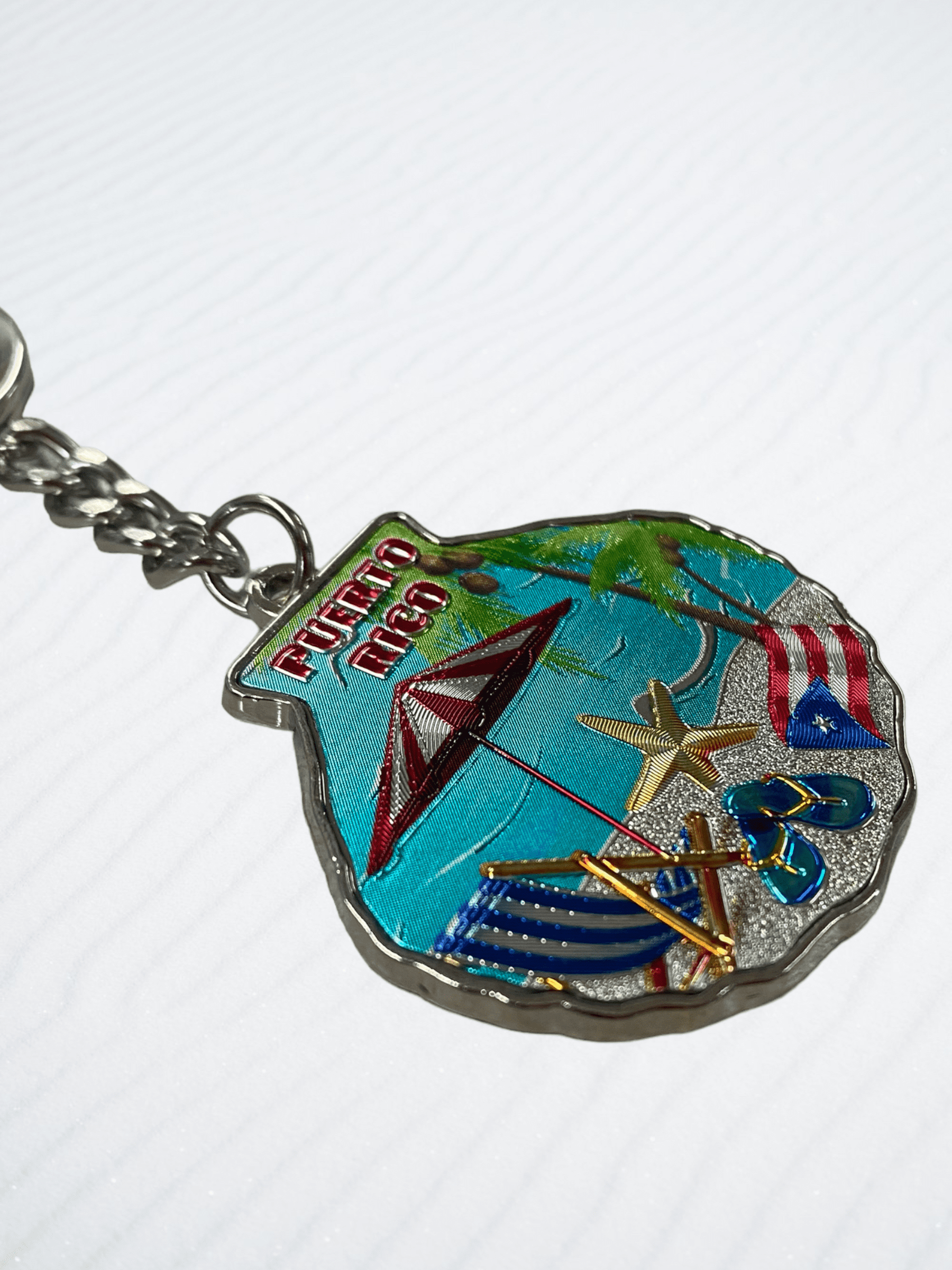 Souvenir de Puerto Rico | Llavero en Metal- Concha de Mar.