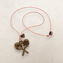 Artesanía en Madera - Collar Maracas con Símbolos Taínos *One Size*